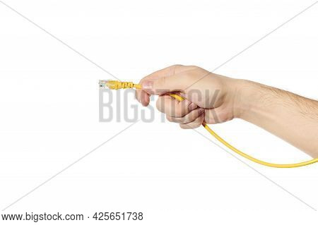 Lan Ethernet Cable In Hand. Yellow Rj45 Twisted Pair Cable For Computer Network. Cat 5e Utp Connecti