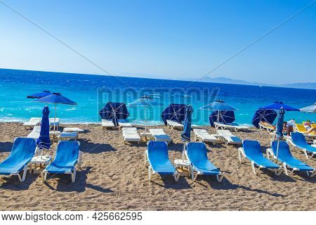 Rhodes Greece 21. September 2018 Relax On Blue Sun Loungers At Vacation In Rhodes Greece With Beauti