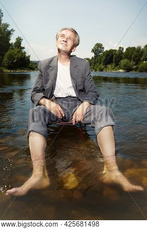 Manager In Grey Suit Became Crazy Of Hot Weather And Cooling In River