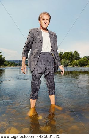 Manager In Grey Suit Became Crazy Of Hot Weather And Cooling In River