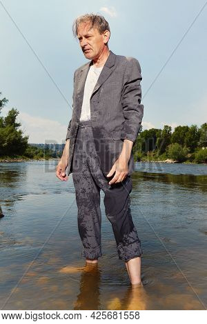 Manager In Grey Suit Became Crazy Of Hot Weather And Cooling In River