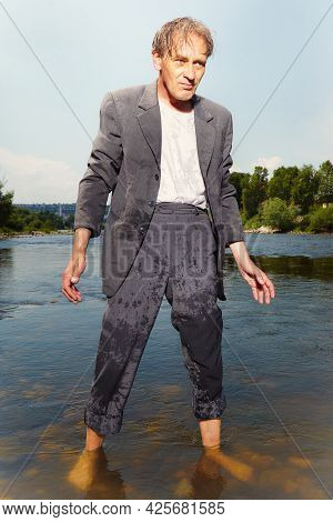 Manager In Grey Suit Became Crazy Of Hot Weather And Cooling In River