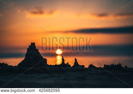 Sunset At Baltic Sea Stone Shore, In Latvia Jurmala Ligo Night