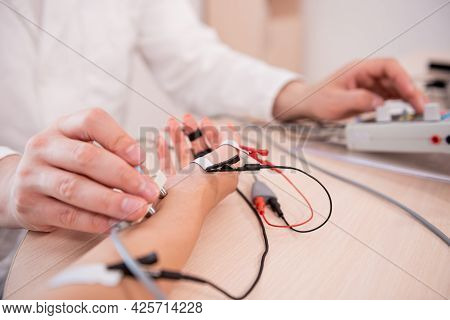 Patient Nerves Testing Using Electromyography At Medical Center