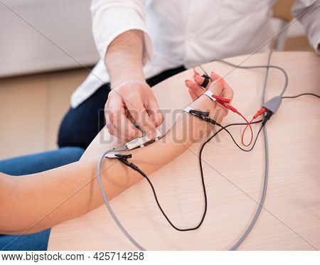 Patient Nerves Testing Using Electromyography At Medical Center
