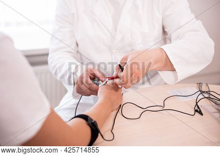 Patient Nerves Testing Using Electromyography At Medical Center