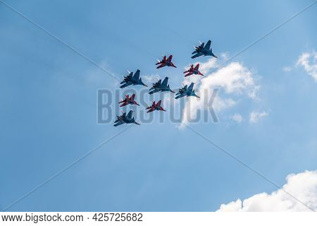 Moscow, Russia - May, 05, 2021: Diamond-shape Of 4 Mig-29 The Russian Knights And 5 Su-27 Swifts In 