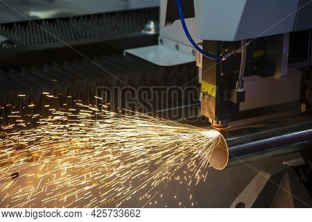 The Fiber Laser Cutting Machine Cutting The Stainless Steel Tube Control By Cnc Program. The Sheet M