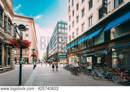 Helsinki, Finland - July 28, 2014: View Of Kluuvikatu Street. Parked Bicycles On Sidewalk.