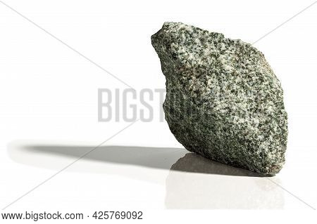 Stone, A Fragment Of Jadeite On A White Background
