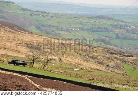 A Scenic View From Midgley Moor In Calderdale West Yorkshire With Surrounding Pennine Farms And Hill