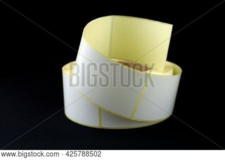 White Roll Of Labels For Thermal Perforation. Stickers For Thermal Or Thermal Transfer Printing. Bab