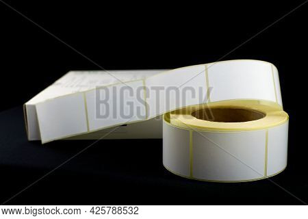 White Roll Of Labels For Thermal Perforation. Stickers For Thermal Or Thermal Transfer Printing. Bab
