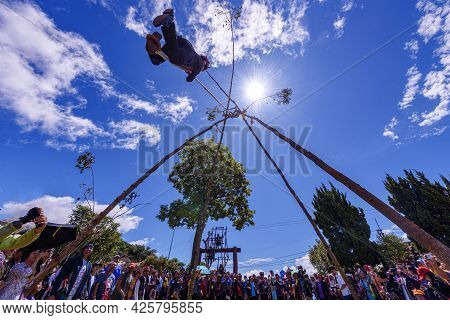 Akha Tribe Playing With The Wooden Swing On Akha Swing Festival At Doi Mae Salong. The Annual Akha S