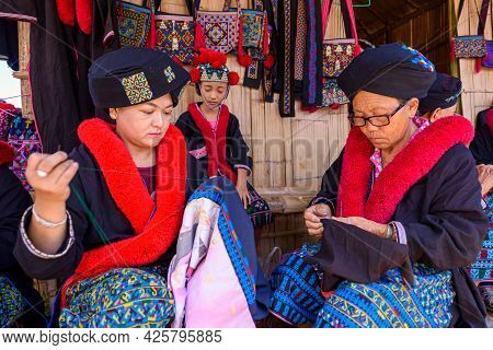 Unidentified Female Mien Hilltribe Embroider Pattern Colored Thread At Doi Mae Salong.