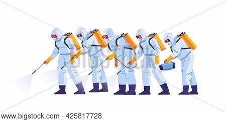 People In Virus Protective Suits And Mask Disinfecting Buildings Of Coronavirus With The Sprayer. Ho