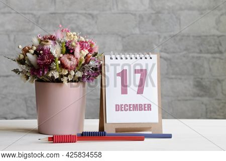 December 17. 17-th Day Of The Month, Calendar Date.a Delicate Bouquet Of Flowers In A Pink Vase, Two