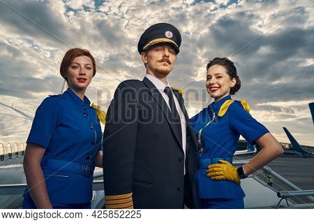 Aircrew Posing For The Camera Before The Take-off