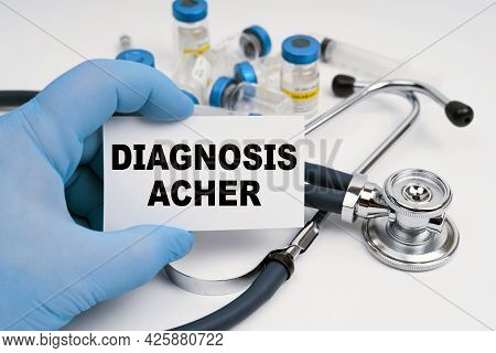 Medicine And Health Concept. A Stethoscope And Ampoules Lie On A White Background, The Doctor Holds 