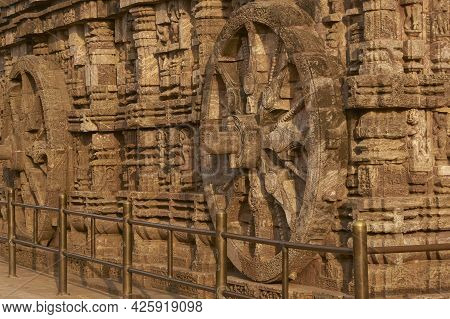 Detail Of Chariot Wheel And Religious Carvings Decorating The Ancient Surya Hindu Temple At Konark O
