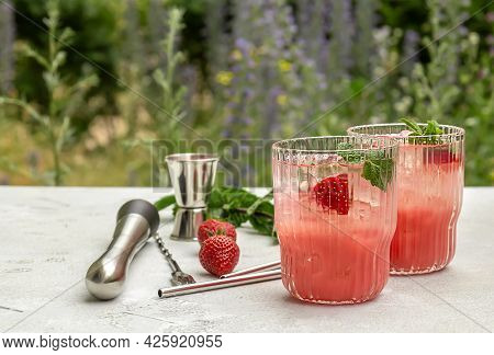 Summer Garden Drink. Strawberry And Mint Cocktail Or Mocktail With Ice. Outdoor Party, Refreshing Be