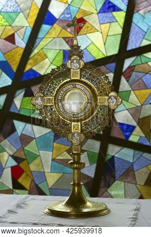 Eucharistic Adoration On Colorful Church Wall Backgrounds In The Chapel. Silence Prayer For Healing.