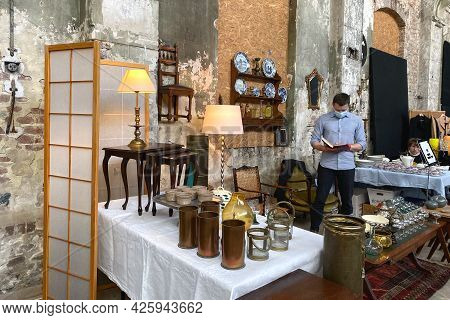 Lviv, Ukraine - May 16, 2021 : People Wearing Face Masks Shopping On Garage Sale In Lem Station, Tlu