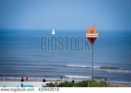 26 June 2021, The Hague, Netherlands, Metal Post With Sign Showing Bathing Area No.4 Or Strandslag, 