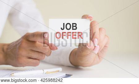 'job Offer' Card In The Woman's Hands. Business, Ethics, Advertising, Marketing.