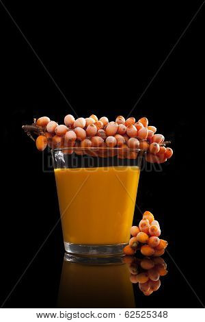 Sea Buckthorn Juice On Black.