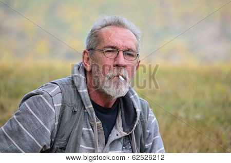 Old Man With Cigarette