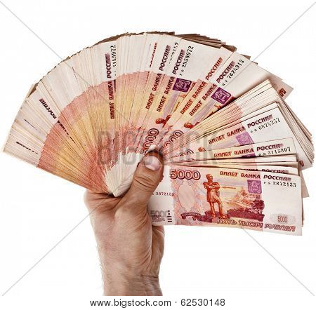 Fan of One Million Banknotes Rubles of the Russian Federation in man hand - isolated on white background