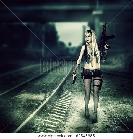 Sexy Woman Killer Holding Automatic And Gun