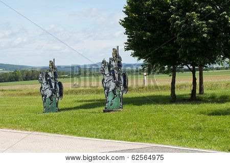 dummies of knights greeting of drivers at the motorway in Burgundy