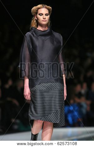 ZAGREB, CROATIA - MARCH 29: Fashion model wearing clothes designed by Branka Donassy on the 'Fashion.hr' show on March 29, 2014 in Zagreb, Croatia
