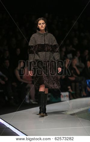 ZAGREB, CROATIA - MARCH 29: Fashion model wearing clothes designed by Branka Donassy on the 'Fashion.hr' show on March 29, 2014 in Zagreb, Croatia