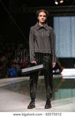 ZAGREB, CROATIA - MARCH 29: Fashion model wearing clothes designed by Branka Donassy on the 'Fashion.hr' show on March 29, 2014 in Zagreb, Croatia