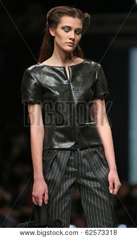 ZAGREB, CROATIA - MARCH 29: Fashion model wearing clothes designed by Branka Donassy on the 'Fashion.hr' show on March 29, 2014 in Zagreb, Croatia