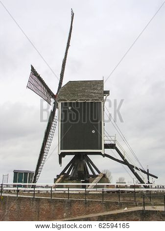 Old Windmill And Pierl In Heusden. Netherlands