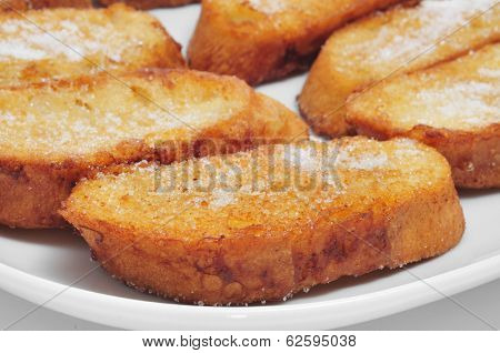 closeup of a plate with torrijas, typical spanish dessert for Lent and Easter