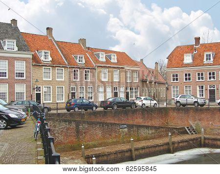 Cars On A Pier In The Dutch Town Of Heusden.