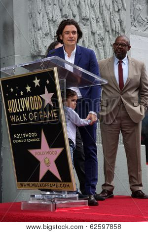 LOS ANGELES - APR 2:  Orlando Bloom, Flynn Bloom at the Orlando Bloom Hollywood Walk of Fame Star Ceremony at TCL Chinese Theater on April 2, 2014 in Los Angeles, CA