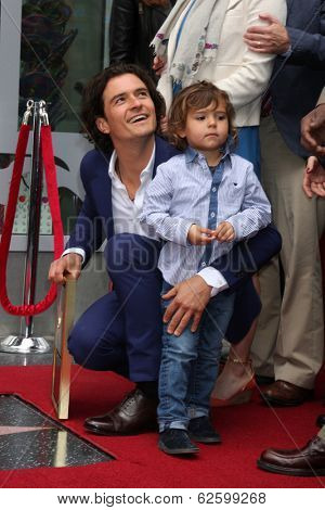 LOS ANGELES - APR 2:  Orlando Bloom, Flynn Bloom at the Orlando Bloom Hollywood Walk of Fame Star Ceremony at TCL Chinese Theater on April 2, 2014 in Los Angeles, CA