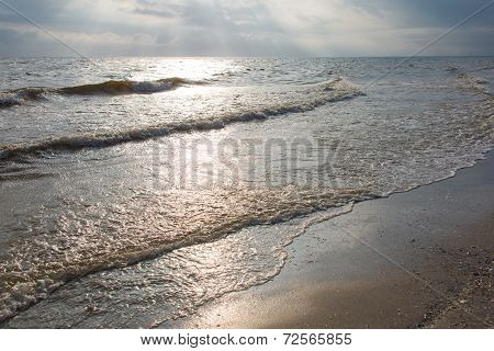 Sea waves at sunset. Black sea, Ukraine