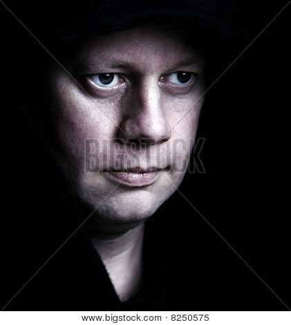 Mean Looking Man In High Contrast Color And Shadow
