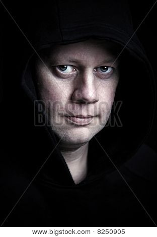 Scary looking man in shadow and high contrast color