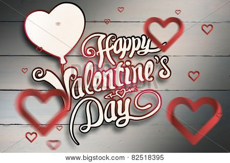 Hearts against painted blue wooden planks