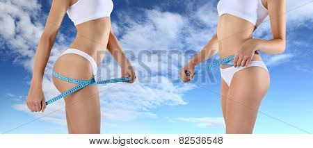 woman tape meter on buttocks and belly