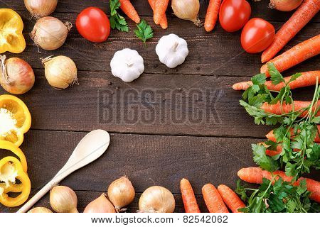 Vegetables mix on the table with wooden spoon