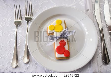 number one shaped birthday cake with baw in white plate